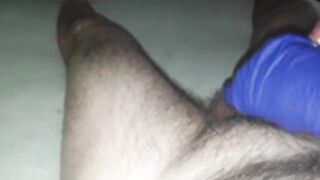 Jerking of in blue glove