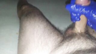 Jerking of in blue glove