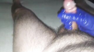 Jerking of in blue glove