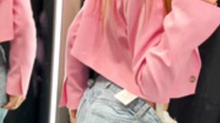 Mastrubating in dressing room.