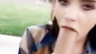 College girl deepthroats dildo outdoors