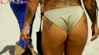 Ebony Lesbian Squirting on Public Beach