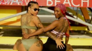 Ebony Lesbian Squirting on Public Beach