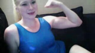 Cute blond gymnast flex her biceps