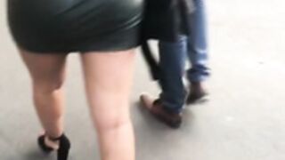 Candid: Following her gf in sexy leather dress