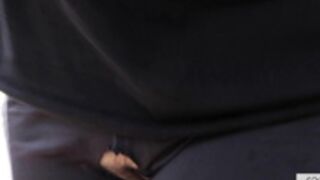 Exhibitionist walking around in ripped jogging pants