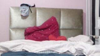 Lantti trying a really small bra on