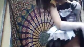 Beautiful European girl tries on revealing maid outfit