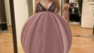 Aylin inflating her belly with water