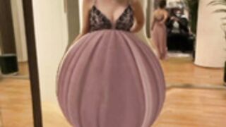 Aylin inflating her belly with water