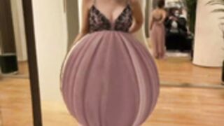 Aylin inflating her belly with water