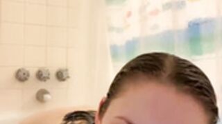 Squishy Girl takes a bath.  Well, kinda