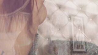 Andrea Kalo licks her boobs