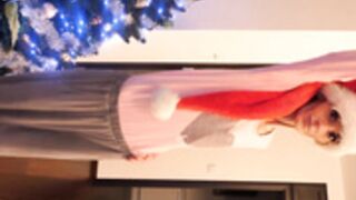 Santa Denisa posing indoors