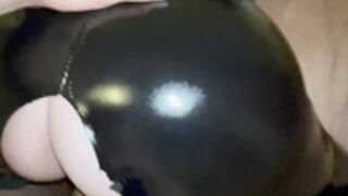 RealTaylerHills in a latex bodysuit