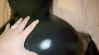 RealTaylerHills in a latex bodysuit