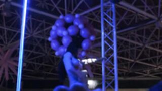 Spanish muscle girl stripping on stage