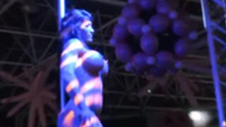 Spanish muscle girl stripping on stage