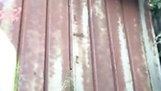 Viking Blonde squirts outside behind a building