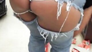 Venus goddess tease bend over showing booty in store