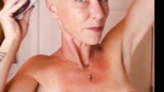 sexy nude mature lady shaves smooth bald