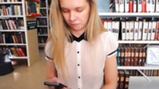 Blonde Slut in White Blouse in a Library
