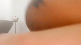 Paulina on bathroom floor teasing
