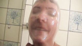 Jenny and Hannah trying out latex condom breathplay