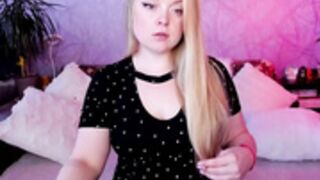 ellawel with a wand and a spotted dress