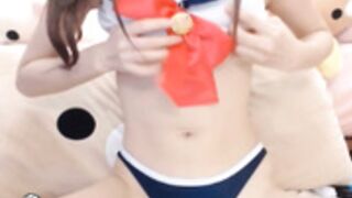 Japanese in sailor suit putting 4 fingers in her ass