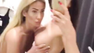 Two girls in a dressing booth