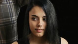 gorgeous young lady smiles as shaved smooth