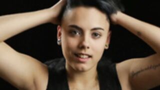 gorgeous young lady smiles as shaved smooth