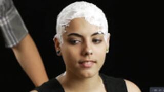 gorgeous young lady smiles as shaved smooth