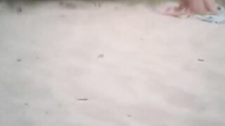 guy finds couple on the beach and just jerks off