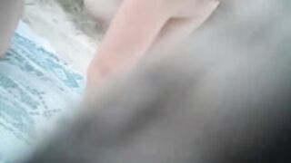 guy finds couple on the beach and just jerks off