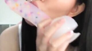 Asian teen masturbating on gaming  chair