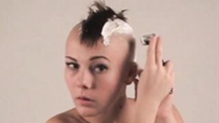 sexy nude pixie haired Brunette shaves smooth bald