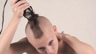 sexy nude pixie haired Brunette shaves smooth bald