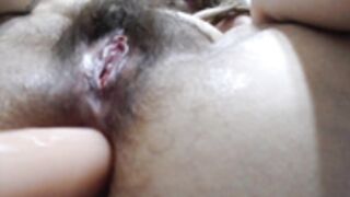 Anal orgasm of a hairy teen with a big ass