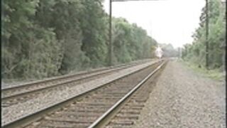 Laurie Noack posing on railroad part 1