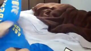 Asian lady humping bed