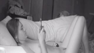 Girl smoke and masturbate in bed while wtaching porn