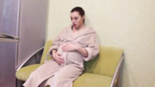 Pregnant sabrina in bathrobe