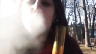 Two girls smoke bong