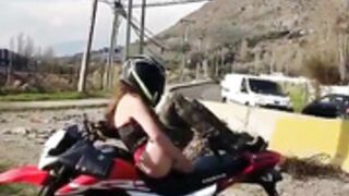 Latina biker girl masturbating the helmet on