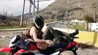 Latina biker girl masturbating the helmet on