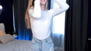 MilaBlush takes off bra under white top