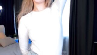 MilaBlush takes off bra under white top