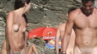 Nudist Couple On The Beach